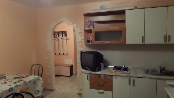 A cozy room. square. in NWR on the clock, Cheboksary - apartment by the day
