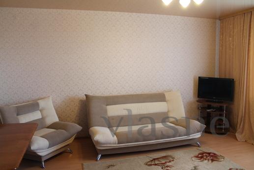 The apartment is in the center of the city. Near shopping ce