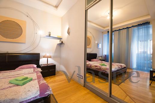 Dwupokojowe mieszkanie z designerskim remontem w centrum, Kyiv - mieszkanie po dobowo