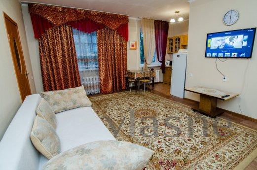 A cozy warm apartment at Zheltoksan Street, corner. Abay! Si