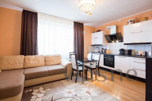 Spacious studio apartment with a balcony, a dressing room an
