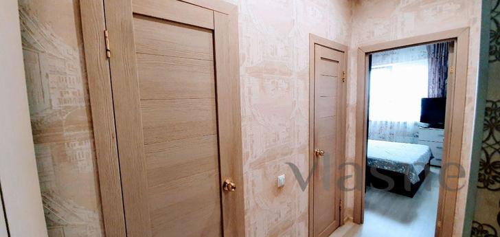 Apartment for rent on Usoltseva 26 AURA, Surgut - apartment by the day