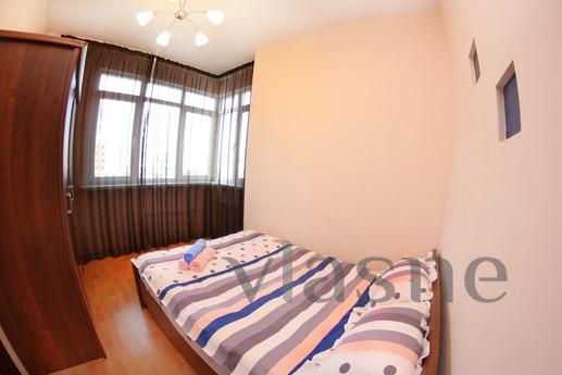 Daily Dostyk Avenue, house 162, Almaty - apartment by the day