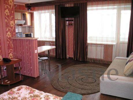 The apartment: Bedroom: a large mirror double bed, sofa, cof