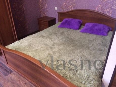 The apartment is located at the intersection of the street. 