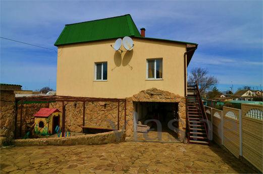 „Nikolas” - prywatny pensjonat w Nikołajewce na Krymie - tan