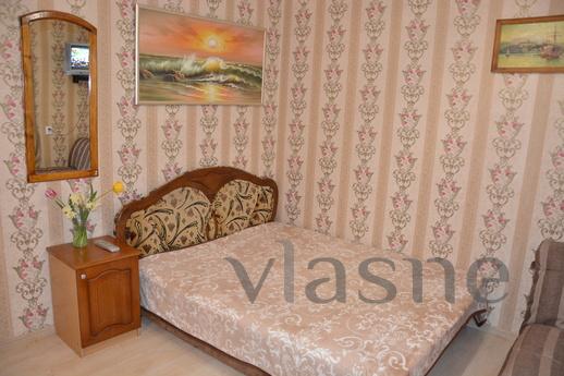 The studio apartment is located in the center of the city, s