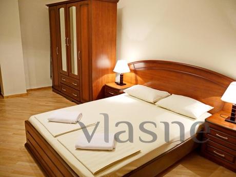 The apartment is located in a modern house in the old city c