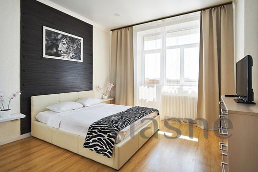 Comfortable one-room apartment with designer business class 