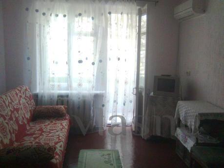The apartment is located in the heart of the city, near the 