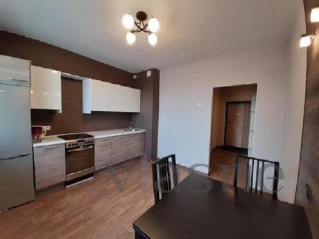 The apartment is located in the center of the city with a de