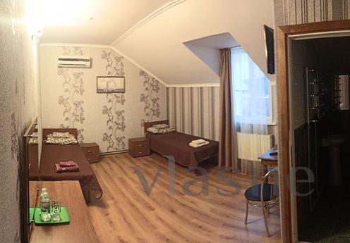 Cafe-hotel KMITOV invites its guests to two and three-bed ro