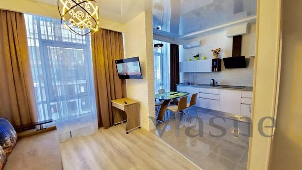 Apartment in a new guarded house with the latest renovation,