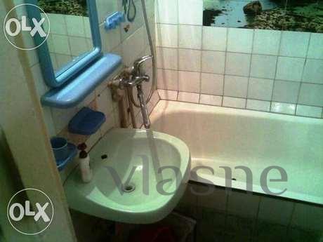 The apartment is located in the city center, close to home p