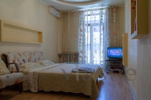 The cozy 2-roomed apartment overlooking Grecheskaya Square. 