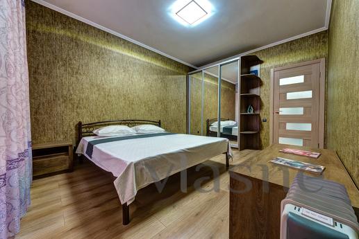 An apartment with great panoramic windows overlooking the me