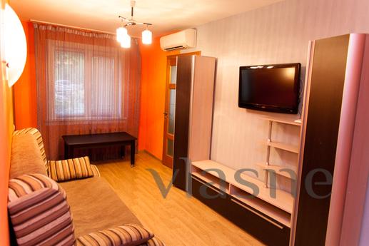 The house is located in the city center, with well-groomed l